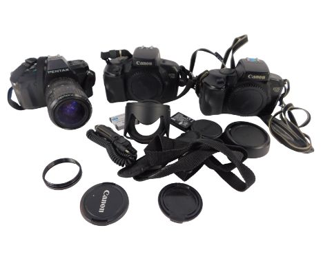 Cameras and optical equipment, including a Pentax P30 camera, a Canon EOS 750 camera, etc. (1 tray)