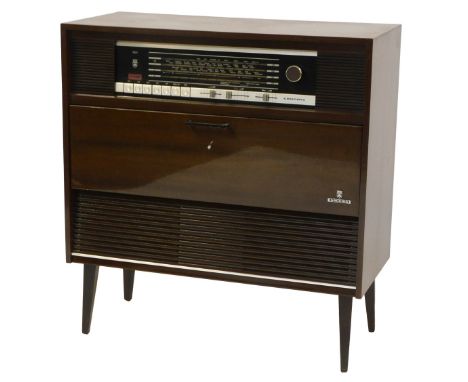 A Grundig stereo console Como 6/GB radiogram, in mahogany veneer casing, on square tapering legs, 82cm high, 78cm wide, 36cm 