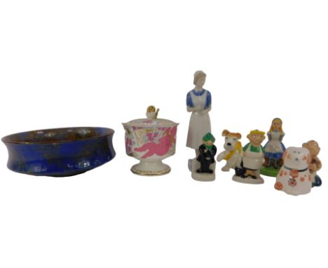 A group of collectable ceramics, to include a Royal Copenhagen porcelain figure modelled as a nurse, 21cm high, a Wade Alice 