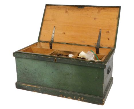 A green painted pine tool chest, 44cm high, 94cm wide, 48cm deep,  the hinged lid enclosing a fitted interior, various tools,