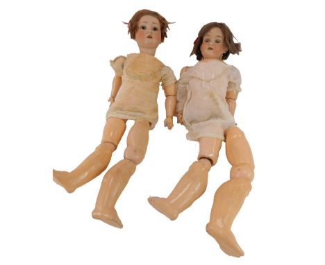 An Armand Marseille bisque doll, No. 390, A4M, approx 55cm high, together with a Schoenau and Hoffmeister bisque head doll, m