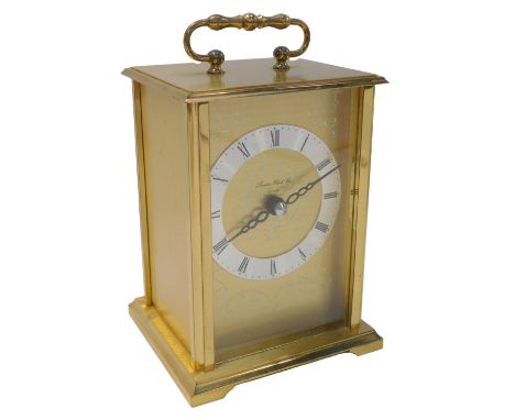 A 20thC brass cased carriage clock, the rectangular brass dial with silvered chapter ring bearing Roman numerals for London C