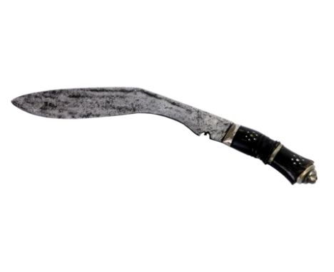 An Eastern machete, with a carved ebony handle, inset with steel, on a curved plain blade, 40cm wide.