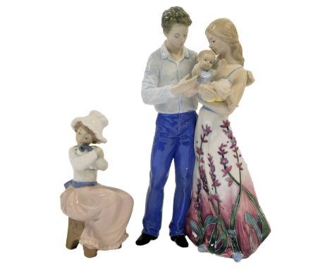 An Old Tupton ware porcelain figure group, modelled as Mother, Father and Child, item No. TW1110LE, limited edition No. 71/30