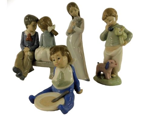 Four Nao porcelain figures, modelled as a young girl and boy seated on a bench, 16.5cm high, a child with soft toys, 19cm hig