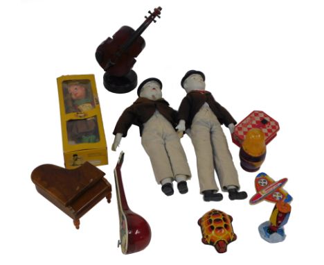 Various toys, including Laurel &amp; Hardy dolls, each with a bisque porcelain face, 47cm high, Gretel Pelham puppet, World J