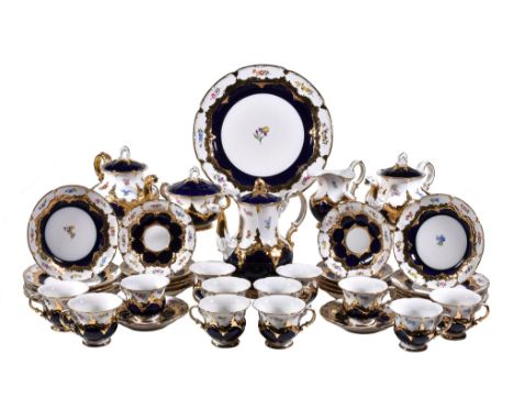  A Meissen composite part tea service,   various dates 20th century, painted with scattered floral sprays above a blue and gi
