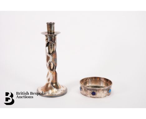 An usual silver plated candlestick approx 22 cms h together with a silver plated dish with blue glass bead decoration approx 