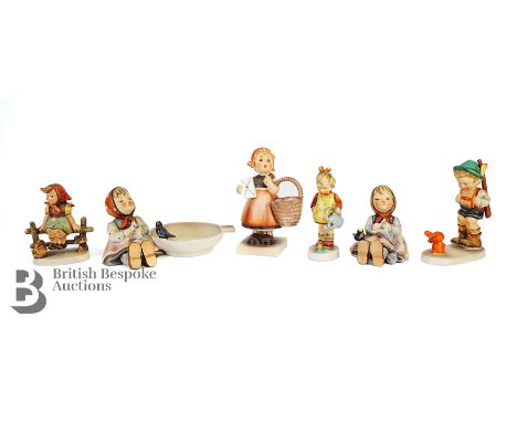 Quantity of Goebel figurines, including an ashtray in the form of a birdbath nr 62; figure knitting nr 69, figure with a lett