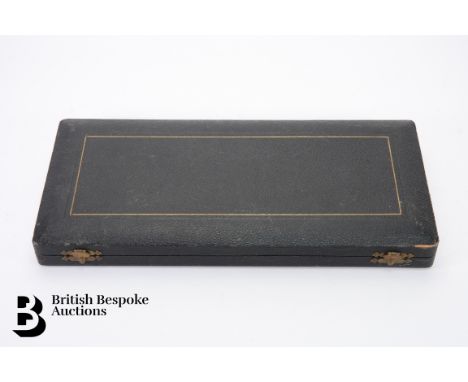 19th century carving set, comprising blade sharpener, fork and carving knife, boxed.&nbsp;