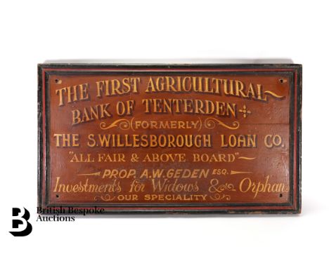 A painted wooden advertising sign for the&nbsp;The First Bank of Tenterden, formerly The Swillesborough Loan Company, All Fai