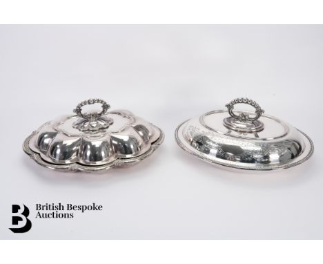 Two silver plated tureen and cover. The first oval with engraved decoration with beaded decoration approx 33 x 27 cms togethe