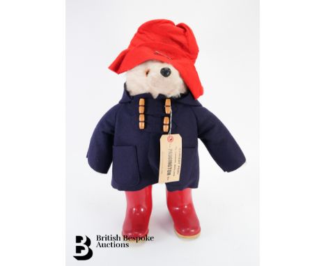 Paddington Bear by Gabrielle Designs with original tag in pocket, wearing a blue felt coat and red Dunlop wellington boats. M