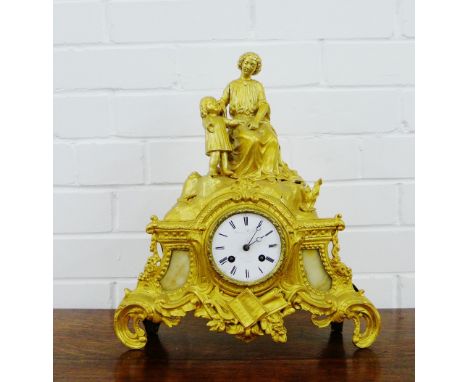 French style gilt mantle clock with a mother and child surmount, above an enamel dial with Roman numerals , 39 x 36cm 