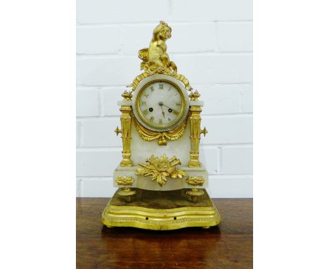 French style white hardstone and gilt  mantle clock surmounted by a cherub, with a clock stand 42 x 24cm (2) 