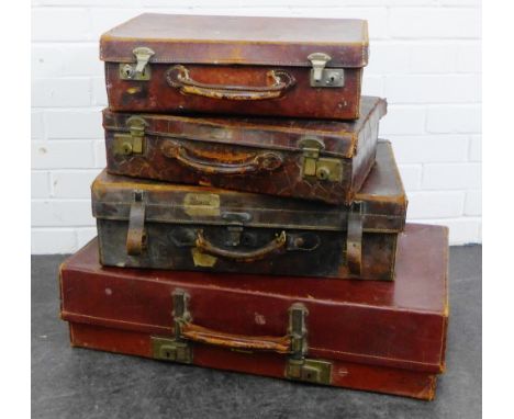 Four vintage leather suitcases, largest 72 x 40cm (4) 