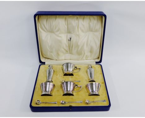 Art Deco six piece cruet set by Mappin &amp; Webb comprising a pair of cocktail shaker style pepper pots, two circular open s