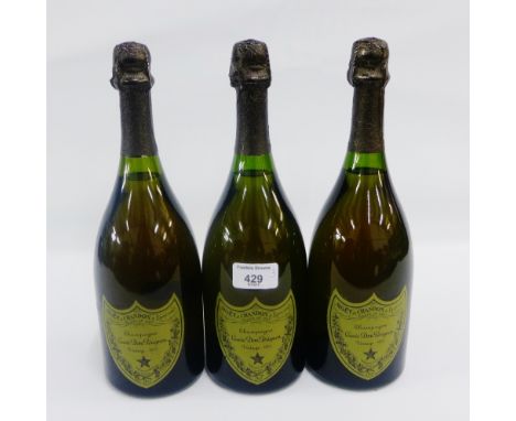 Three bottles of Moet &amp; Chandon, champagne Cuvee Dom Perignon, Vintage 1975 labels (3) 