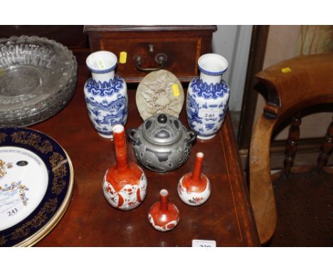 A pair of Chinese blue and white vases; two Japanese vases; a carved soapstone plaque and a pewter lidded bowl