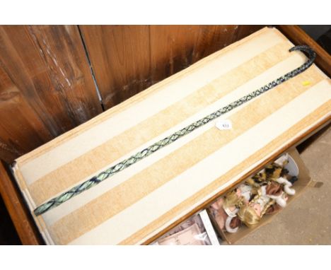 A Victorian coloured glass twist walking stick in the Nailsea style, approx. 88cm long 