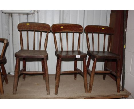 Three elm child's stick back chairs 