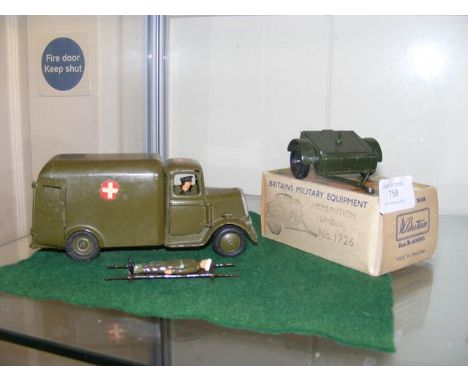 A boxed Britain military ammunition limber, together with ambulance and man on stretcher