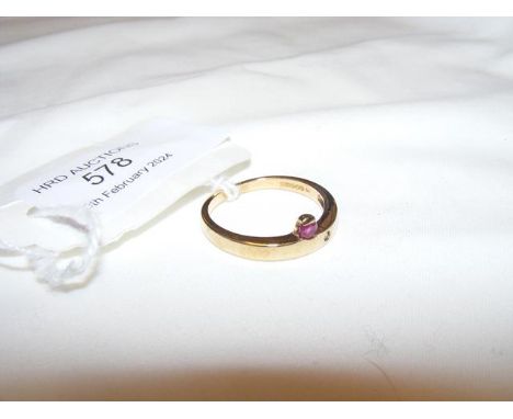 A 9ct ruby and diamond ring - approx. size O/P