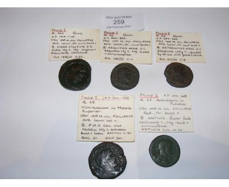 One Roman Sestertius, two AS and two other coins of Philip I (AD244-249) 