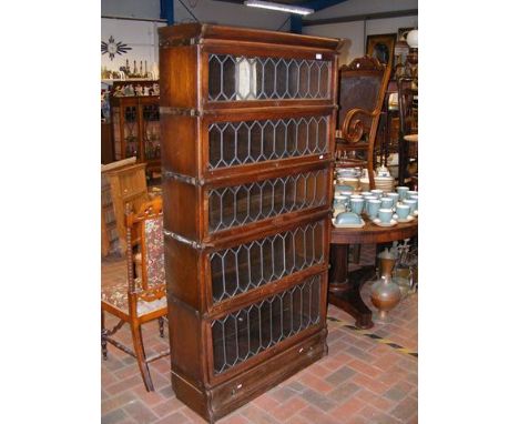 An oak five section Globe Wernicke bookcase with lead glazed front - width 87cms CONDITION REPORT Our team of trusted experts