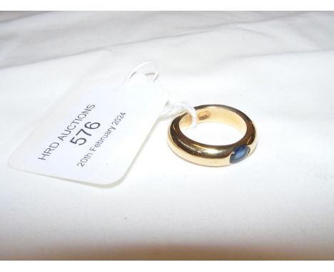 An 18ct? oval sapphire mounted ring - approx. size K