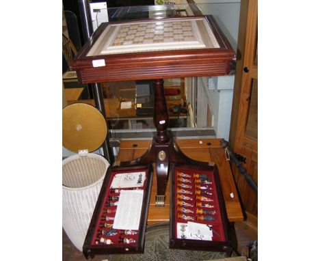 A Franklin Mint 'Raj' chess set on chess table 