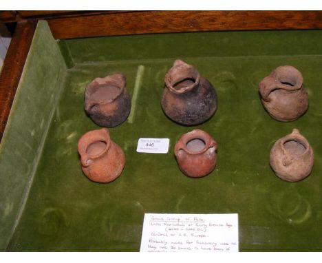 A selection of six late Neolithic or Early Bronze Age miniature pots, believed to be from a Grave group