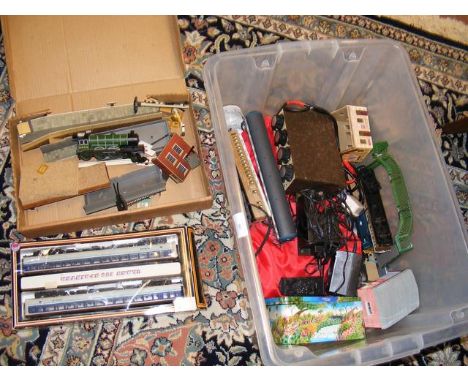 A box of 00 gauge train model parts, including locomotive, rolling stock and outbuildings 
