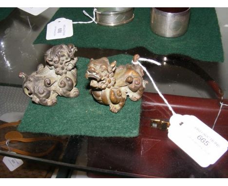 Two small bronze mythical beast ornaments - 4.5cms high