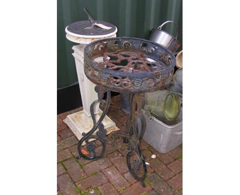 A garden sundial, together with wrought metal plant stand 