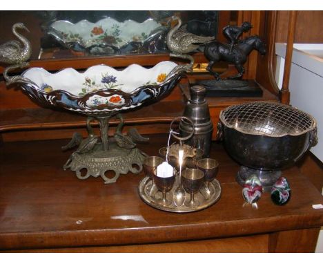 An elegant ceramic and metal mounted table centre, together with vintage cocktail shaker, bronze style jockey on horseback