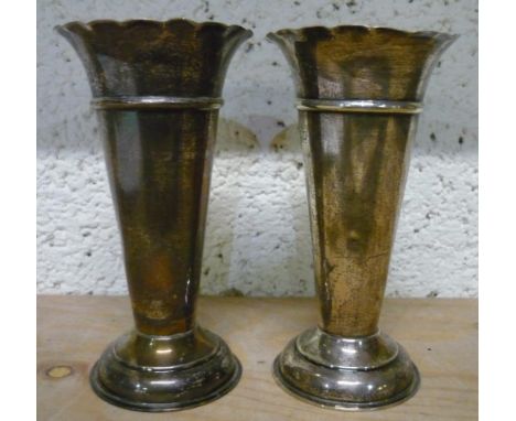 Pair of Geo. V hallmarked silver trumpet shaped vases, with shaped rims on stepped bases, (12cm), London 1912 by GS &amp; Co,