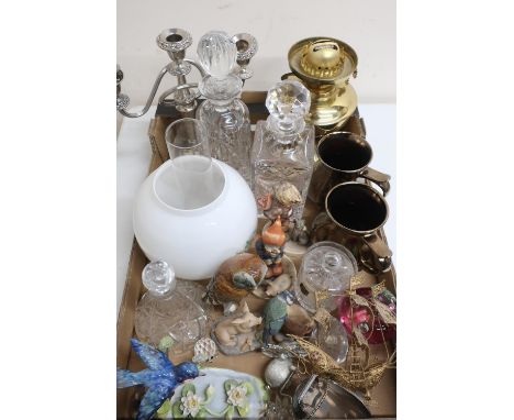 Two Hummel figures, a J T Jones Crown Staffordshire model of a bird, Swarovski model of a mouse, two decanters, a brass oil l