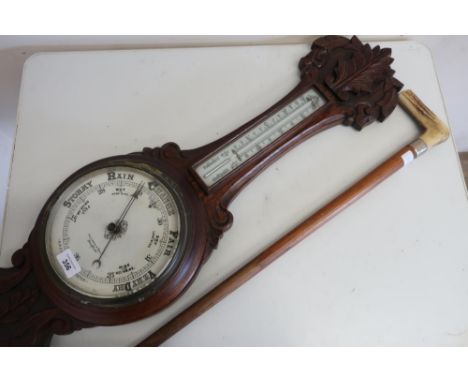 20th C aneroid barometer with thermometer, in carved oak case, by Fattorini &amp; Sons Bradford, and a antler handled walking