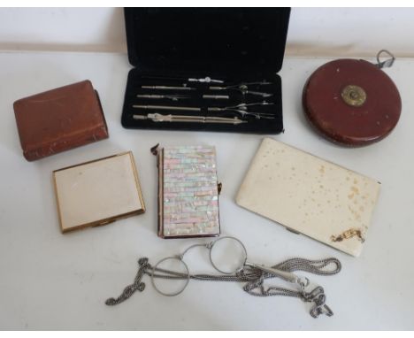 Early 20th C French aide memoire with Mother of Pearl cover, Chesterman leather cased metal tape measure, travelling clock, c