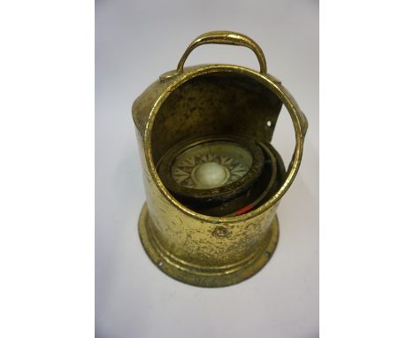 A Brass Ships Binnacle Compass, the compass is raised on a gimble mount, inscribed to Whyte Thomson &amp; Co Glasgow