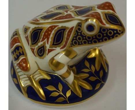 A Royal Crown Derby Paperweight, Modelled as a frog, silver button to underside, 8cm highCondition reportThe item is generall