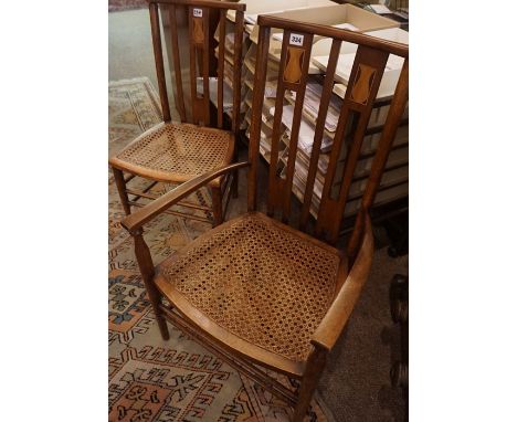 Two Near Matching Liberty Style Arts &amp; Crafts Parlour Chairs, Both having inlaid panels and cane seats, 85cm high, (2)