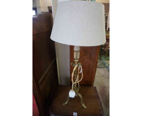 A Gilded Wrought Iron Table Lamp, 57cm high, fitted for electricity, with shade