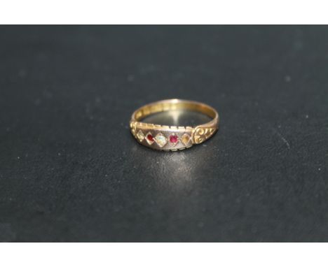 A HALLMARKED 15 CARAT RUBY AND DIAMOND RING,  approx weight 2.1g, ring size P