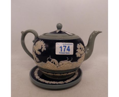 Copeland Spode, Hunting Relief Teapot on Stand. Decorated in tri-colour with sprigged, imprinted and moulded motifs.