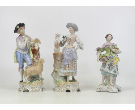 Three Porcelain Figures From Germany 19th Century Including Shepard With Lamb, Lady With Flowers and Lady With Lamb On A Trun