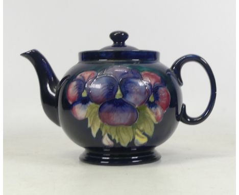 A Moorcroft Pansy Degign on Dark Blue Ground Teapot circa 1940, impressed marks to base, height 14.5cm