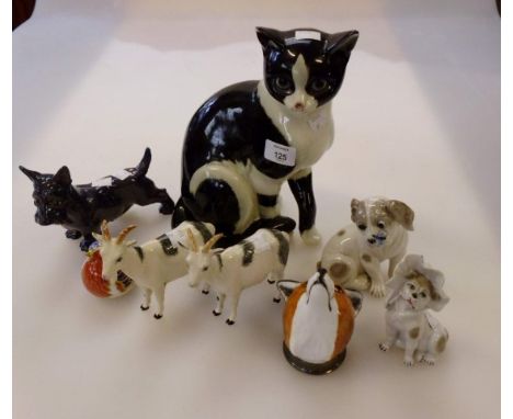 A pair of Beswick goats, together with a Sylvac terrier and other ceramic animal figures