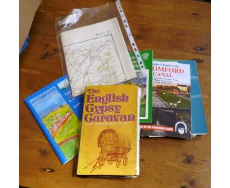 A collection of vintage postcards, maps and books of gypsy caravans